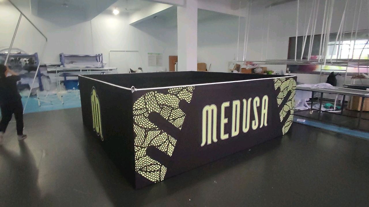 Medusa 6x6m Custom Acrylic Backlit Trade Show Stand